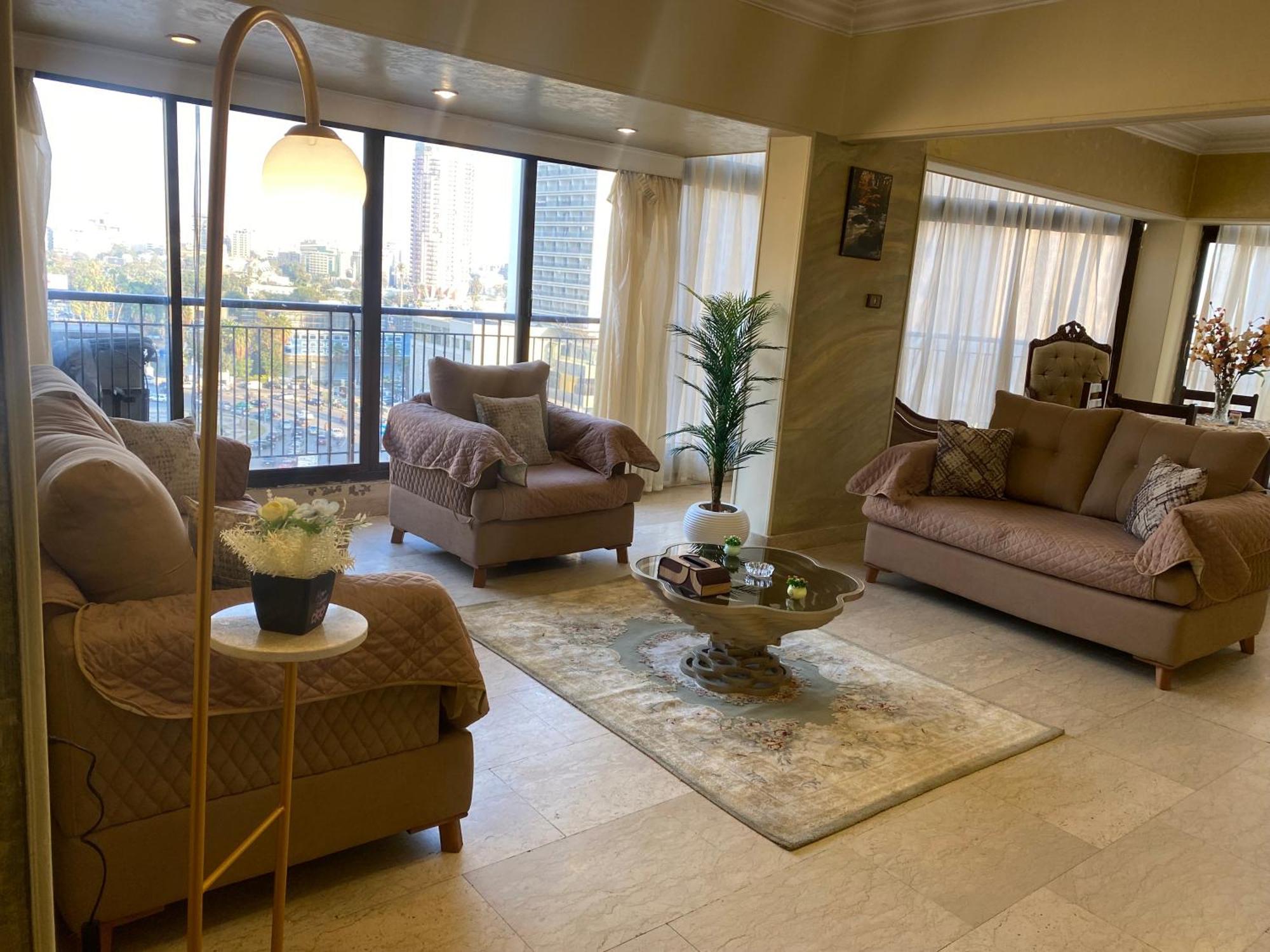 Апартаменты Nile View Dokki Каир Экстерьер фото