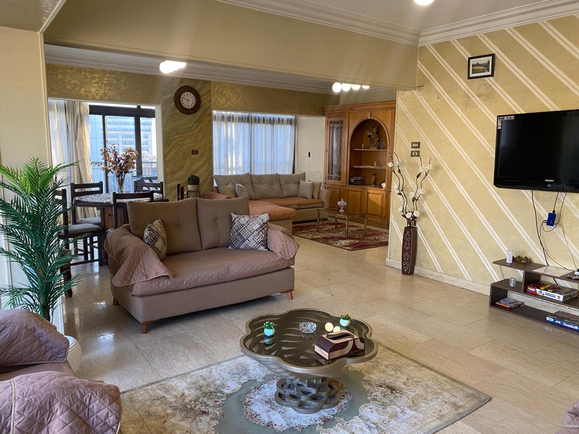 Апартаменты Nile View Dokki Каир Экстерьер фото