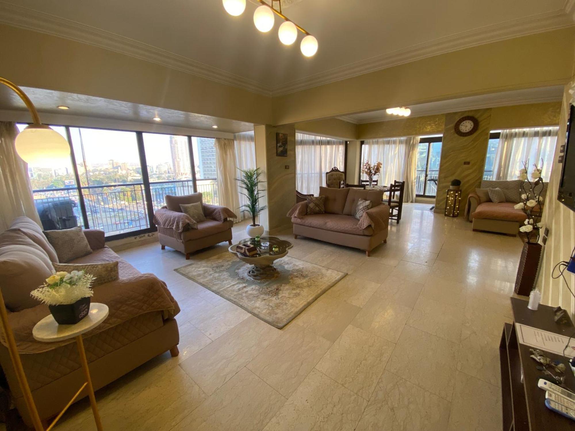 Апартаменты Nile View Dokki Каир Экстерьер фото